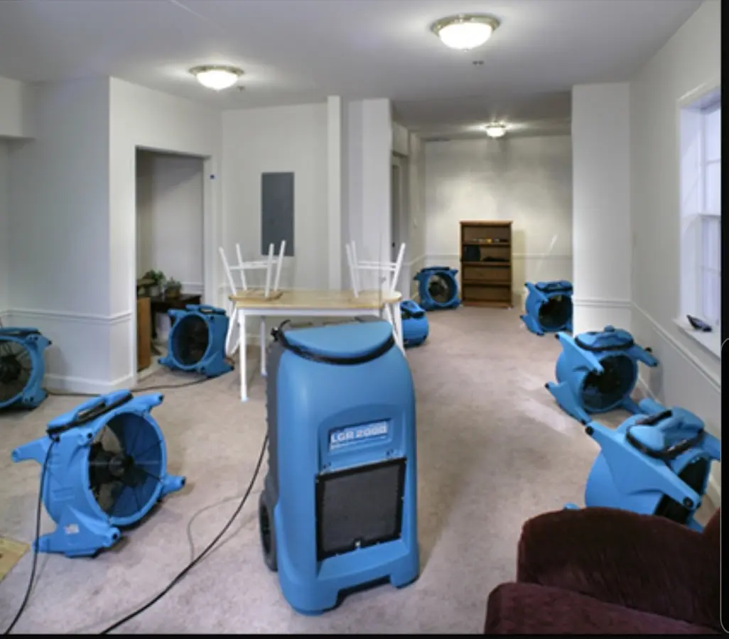 Air movers and dehumidifier setup for Water Damage Restoration in Moyock
